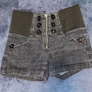 High waist with elastic, dark denim jean shorts. Brand is Love Culture jeans